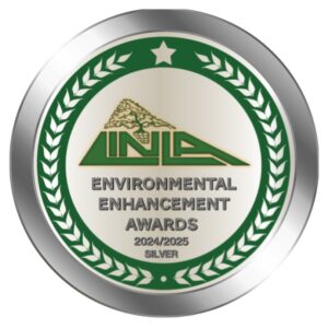 Silver badge featuring a star and laurel wreath design. In the center, a tree with INLA below it, followed by text: Environmental Enhancement Awards 2024/2025 Silver.